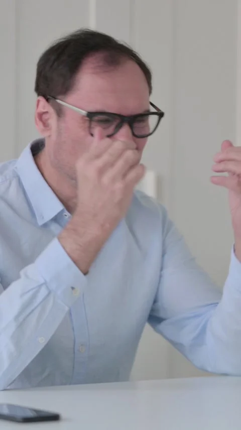 Upset Middle Aged Man Feeling Worried While Sitting in Office, Vertical Video 스톡 동영상 339585216