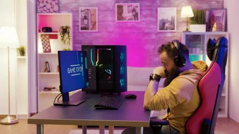 Upset professional game player after losing an important online game 스톡 사진