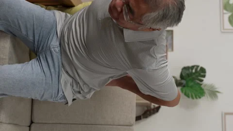 Upset senior elder man feel sudden back pain Stock Footage 229621073