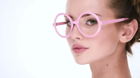Upset serious woman posing at camera, pink glasses Stock Footage 46340907