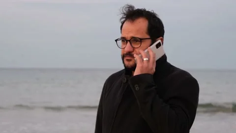 Upset talking phone Stock Footage 169748591