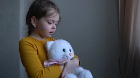 Upset Ukrainian girl crying protesting war conflict. Child against Russian war Stock Footage 172200523