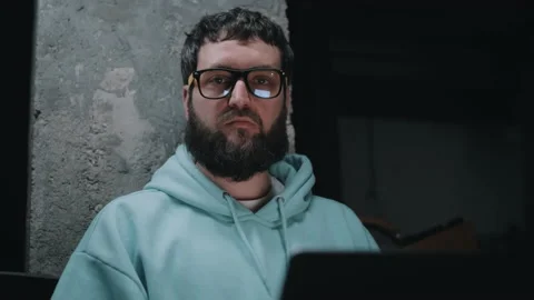 Upset web developer in a bomb shelter Stock Footage 187609315