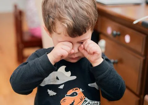 Upset young boy is crying and whining Stock Photos