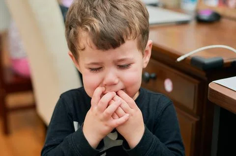 Upset young boy is crying and whining Stock Photos