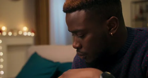 An upset young man of African appearance broke up with girlfriend. It is 動画素材 211069245