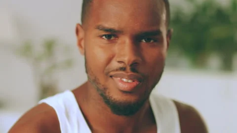 Upset young man looking sad and distraught. Medium close on 4k RED camera. Video stock 199458580