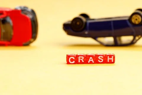 Upside-down car accident selective focus on the word wreck Foto stock