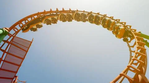 Upside down is down during 360 degree rollercoaster ride Stock Illustration
