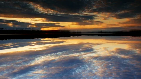 Upside down frame shot of beautiful landscape of dramatic sunrise or sunset over Stock Footage 116610774