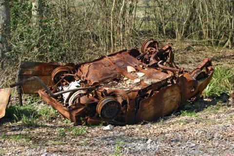 Upside down rusting car Stock Photos