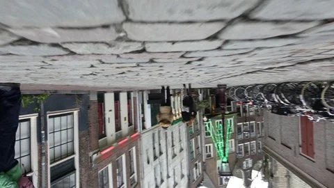 Upside down street pedestrians Stock Footage 72265015
