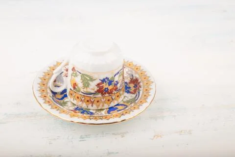 Upside down Turkish coffee cup over saucer Stock Photos