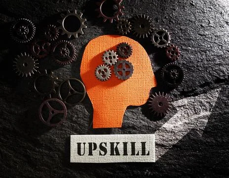 Upskill and gears Stock Photos