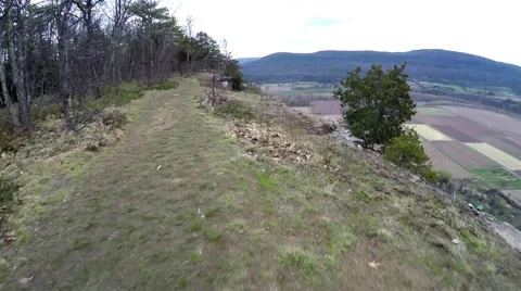 Upstate NY - Fly off Cliff, over trees, farms Stock Footage 50147908