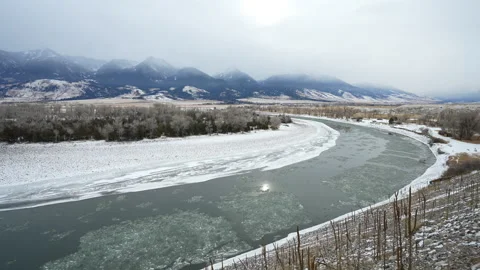 Upstream view of ice choked river in Montana Stock Footage 327714968