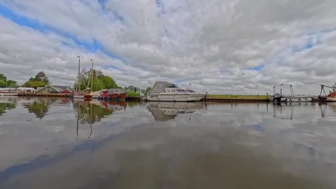 Upton Dyke, a small mooring off the River Bure, Norfolk Broads Stock-Footage 309834139