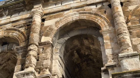 Upward Close-Up of Ancient Stone Arches and Columns at Nimes Amphitheater Vídeos de archivo 339066200
