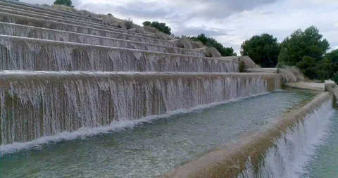 Upward drone flight on water cascading staircase Video stock 124378700