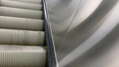 Upward Escalator Steps and Metallic Silver Panel Vídeo Stock 331686650