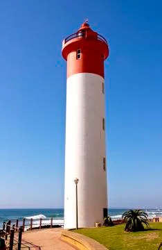 Upward looking view of red and white lighthouse Stock Photos