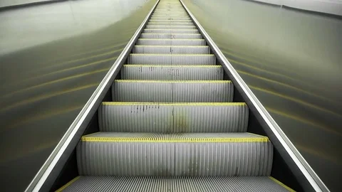 Upward movement standing on an empty escalator Stock Footage 73936149