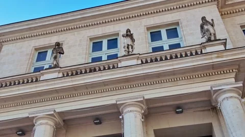 Upward pan of the neoclassical façade overlooking Place du Commerce, Nantes Stockbeeldmateriaal 339099724