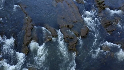 Upward panning flyover of the Ocoee river. Stock Footage 113980754