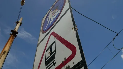 Upward rotating tracking shot of railway railroad train logo at crosing point 動画素材 101568621