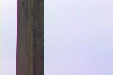 Upward Tilt of Surveillance Camera Mounted on a Post Stock Footage 141030