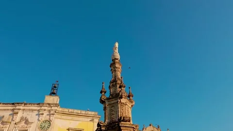 Upward tracking shot of the Immaculate Conception Spire in Piazza Salandra Stock Footage 315936591