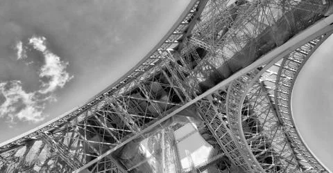 Upward view of Eiffel Tower on a beautiful sunny winter day - Paris - France Stock Photos