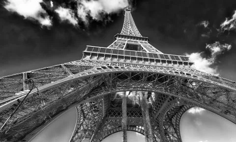 Upward view of Eiffel Tower on a beautiful sunny winter day - Paris - France Stock Photos