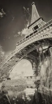 Upward view of Eiffel Tower on a beautiful sunny winter day - Paris - France Stock Photos