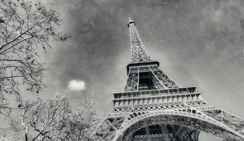 Upward view of Eiffel Tower on a beautiful sunny winter day - Paris - France Stock Photos