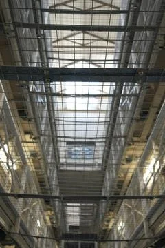 Upward View Through Security Netting In Shrewsbury Prison, Shropshire, England. Stock Photos