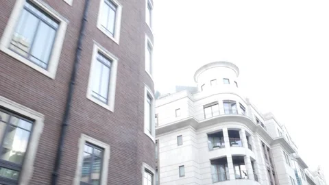 Upwards angle tracking shot of London buildings Stock Footage 285674368