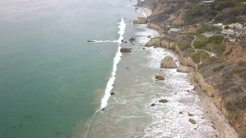 Upwards Drone Aerial of Coastline Waves Crashing 4k Stock Footage
