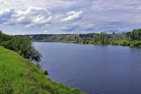 The Ural river Sylva flows under the mountain in the river valley, near the v Stock Photos