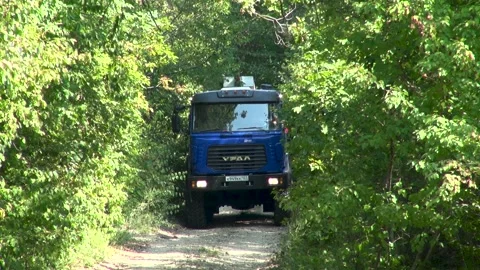 Ural vehicle withURB 2A2 drilling rig is moving along mountain dirt road. Stock Footage 156544179