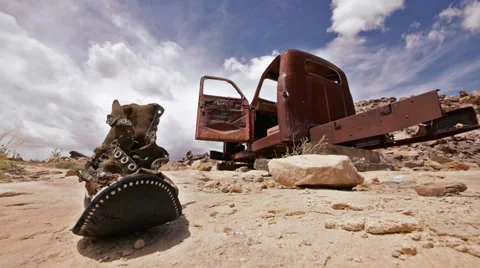 Uranium Badlands Ghost Town Old Boot and Rusty Truck Fast Clouds Stock Footage 38149157