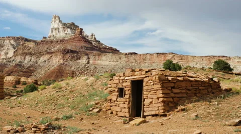 Uranium Badlands With Old Stone Rock Cabin House in Wilderness Stock Footage 53012848