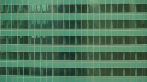 Urban abstract close up view of multiple steel and glass windows. 스톡 사진