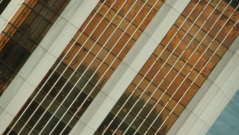 Urban abstract close up view of multiple steel and glass windows. Foto stock