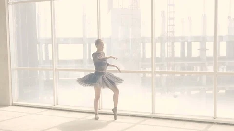 Urban Ballet dance performance by a young girl in slow motion Stock Footage 93132176