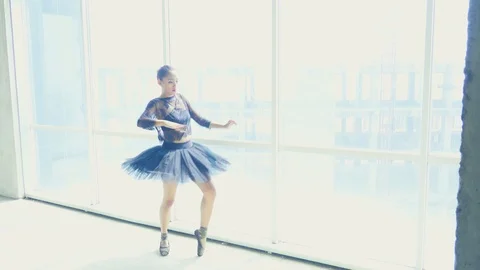 Urban Ballet dance performance by young girl wearing black Ballerina costume Stock Footage 93195571