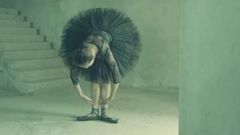 Urban Ballet dance performance by young girl wearing black Ballerina costume Stock Footage 93196347