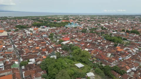 Urban Banyuwangi East Java Indonesia Drone Rise Above Rooftops 4K 60FPS 库存影片 342824787