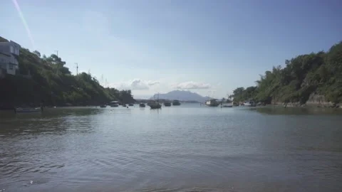 Urban beach in slow motion with moored boats. Ribeiro Beach, Brazil. Stock Footage 216190889