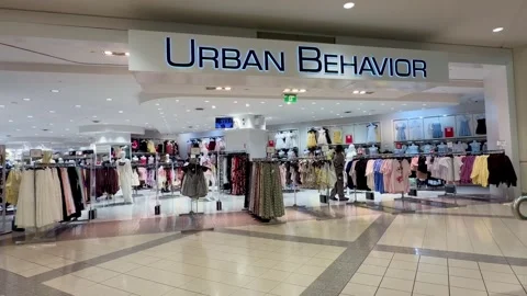 Urban Behavior Clothing Store Front in Shopping Mall, 4K Stock Footage 332415304